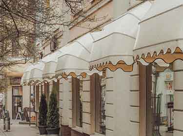 NYC commercial awning cleaning services for businesses, ensuring spotless, well-maintained awnings that boost curb appeal and protect your property.