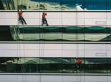 Expert window cleaning team providing spotless, crystal-clear windows for NYC office buildings and commercial spaces.